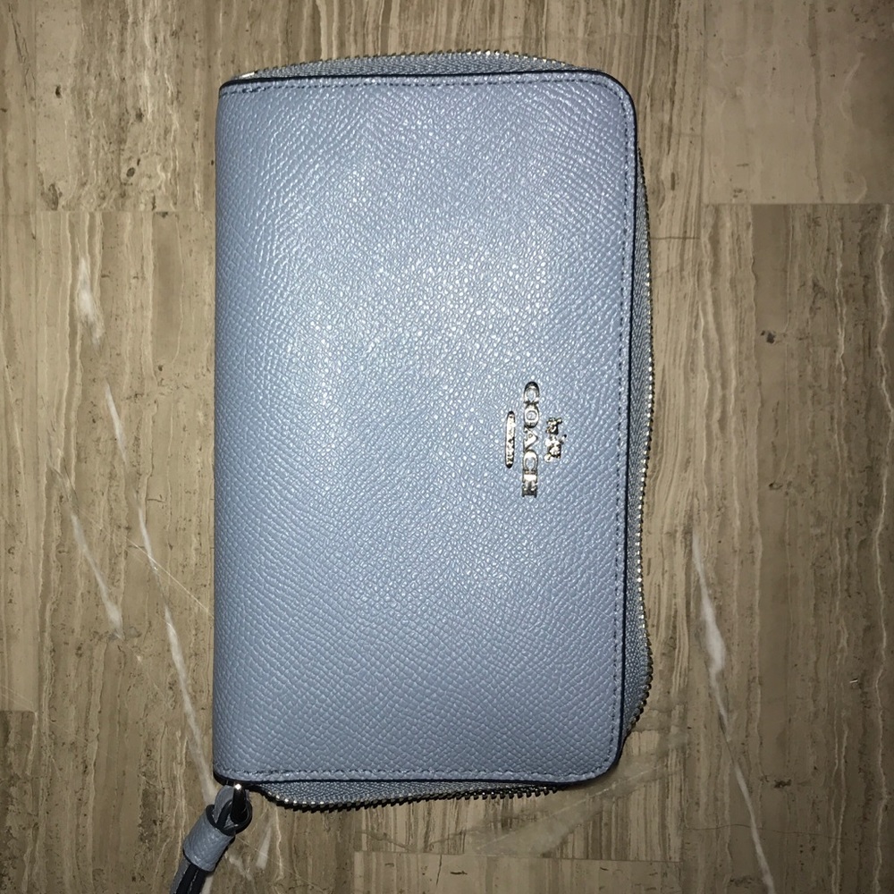 Authentic Coach wristlet/phone holder. New